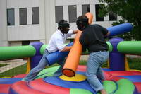 Joust Action Gladoator on a Rocking Platform