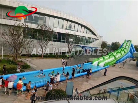 Customized giant green inflatable city water slide , slip n slide the city